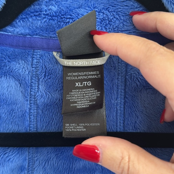 The North Face blue jacket with soft fur-like inside. - Picture 3 of 4